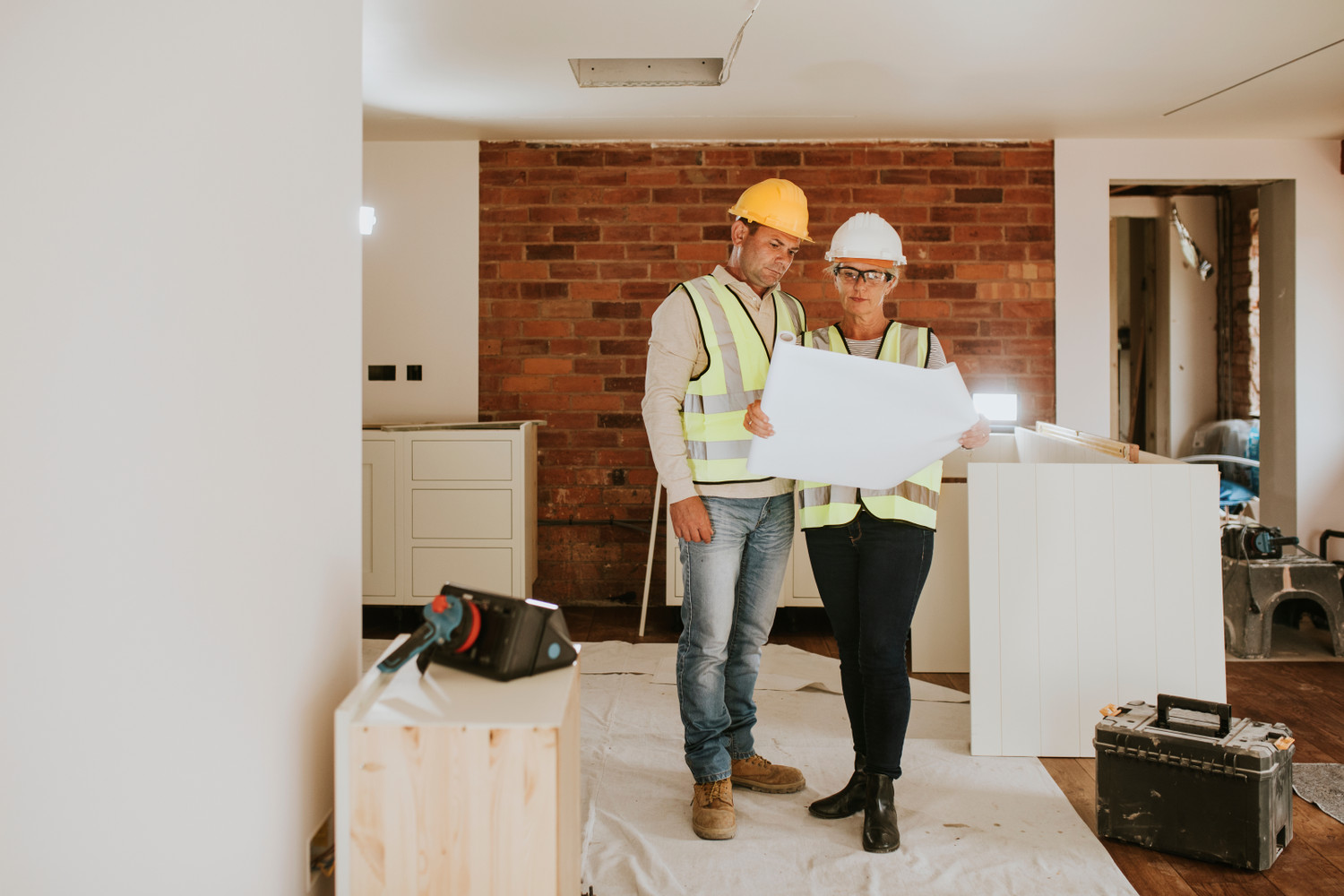 Contractor,Coworkers,Working,Together,On,Remodeling,Home