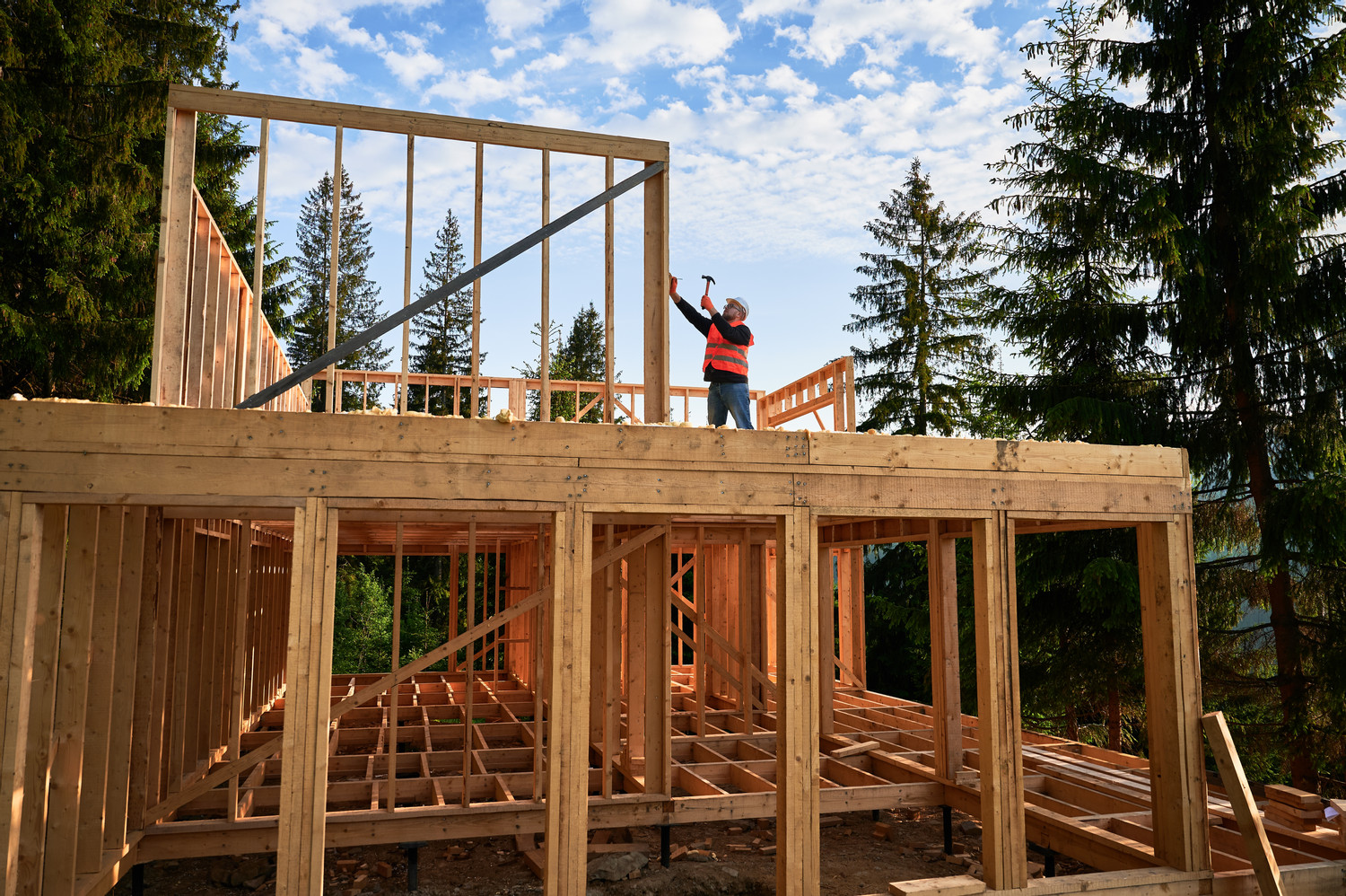 Wooden,Two-story,,Frame-built,Home,Is,Being,Erected,By,The,Carpenter